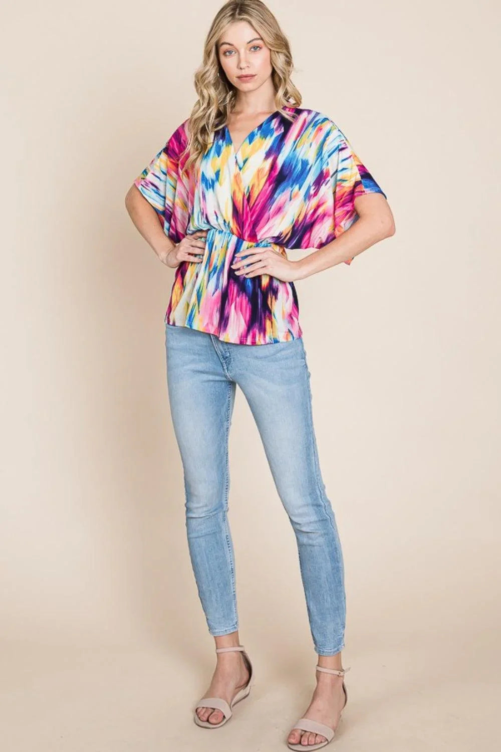 BOMBOM Printed Surplice Peplum Blouse - Abundia House