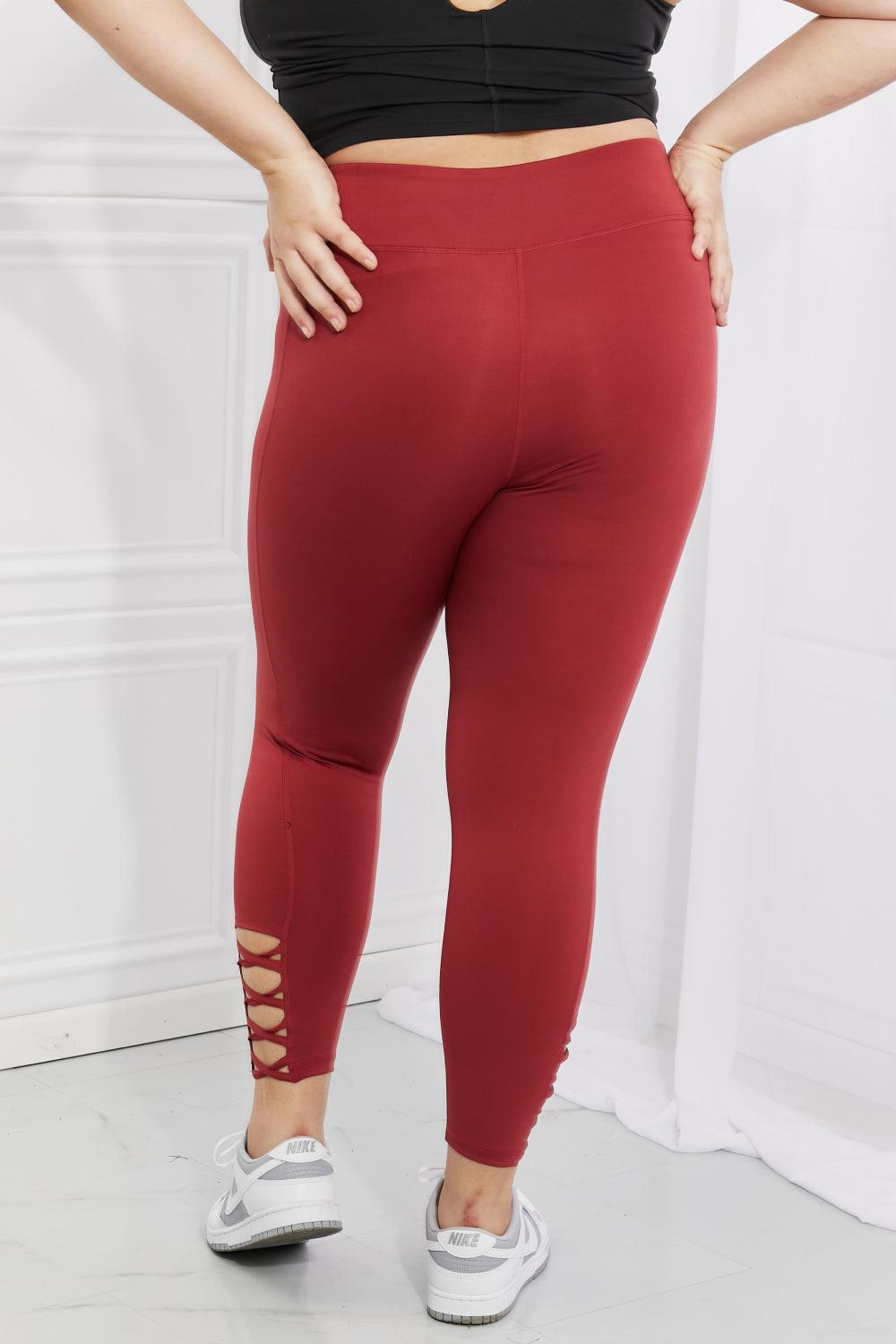 Yelete Ready For Action Full Size Ankle Cutout Active Leggings in Brick Red - Abundia House