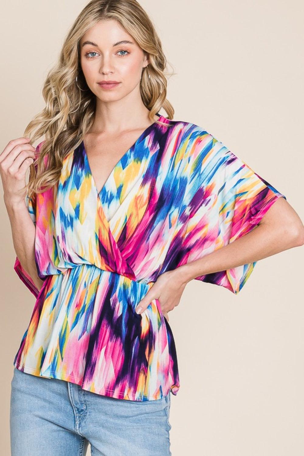 BOMBOM Printed Surplice Peplum Blouse - Abundia House