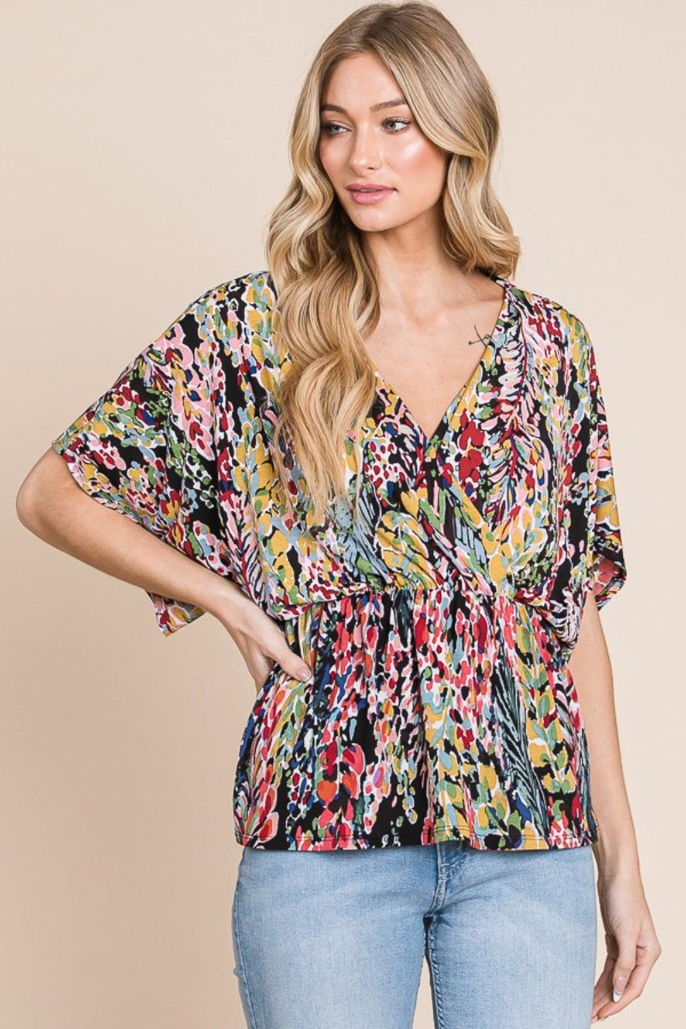 BOMBOM Printed Surplice Peplum Blouse - Abundia House