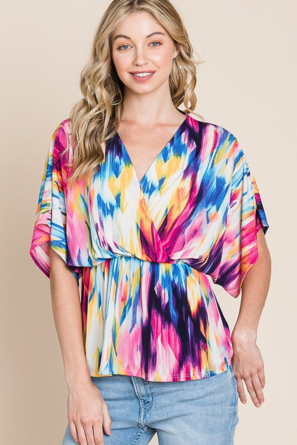 BOMBOM Printed Surplice Peplum Blouse - Abundia House