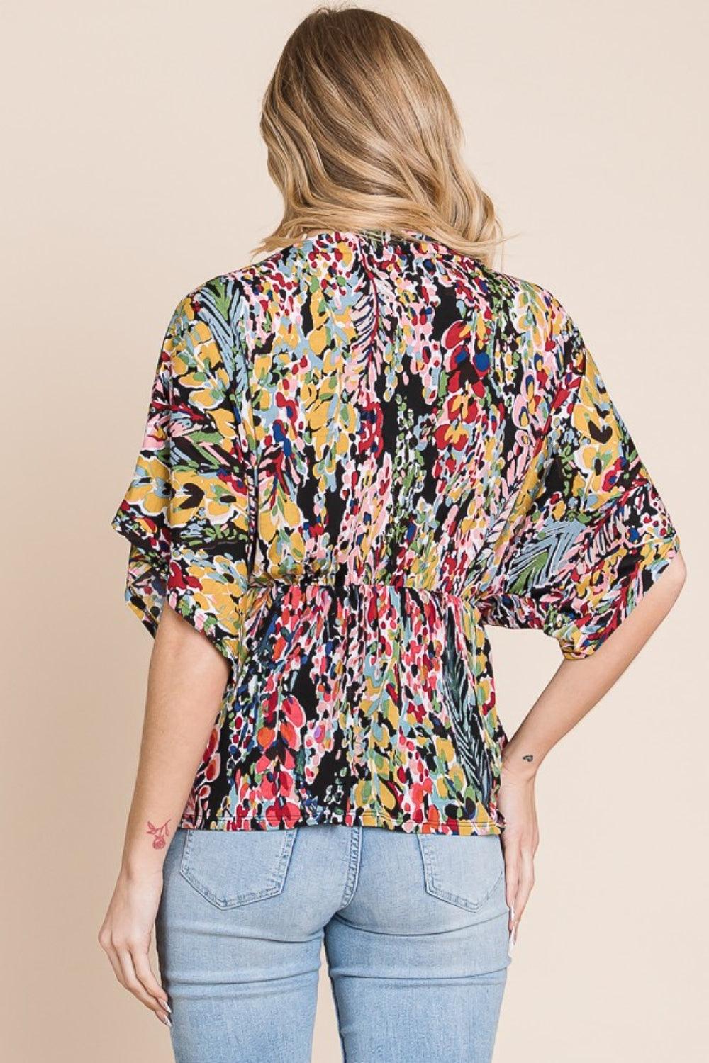 BOMBOM Printed Surplice Peplum Blouse - Abundia House