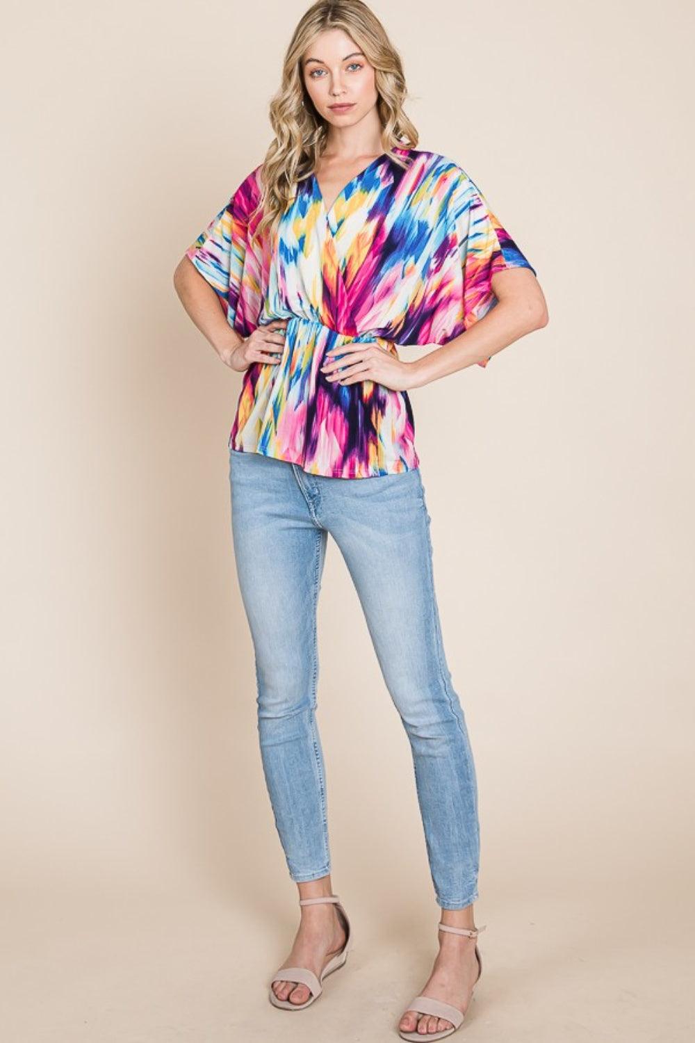 BOMBOM Printed Surplice Peplum Blouse - Abundia House