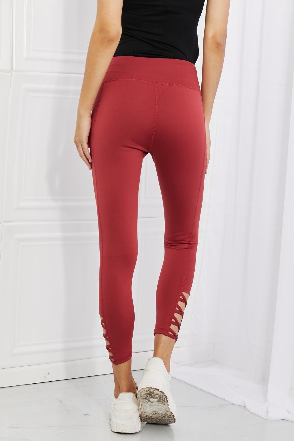 Yelete Ready For Action Full Size Ankle Cutout Active Leggings in Brick Red - Abundia House