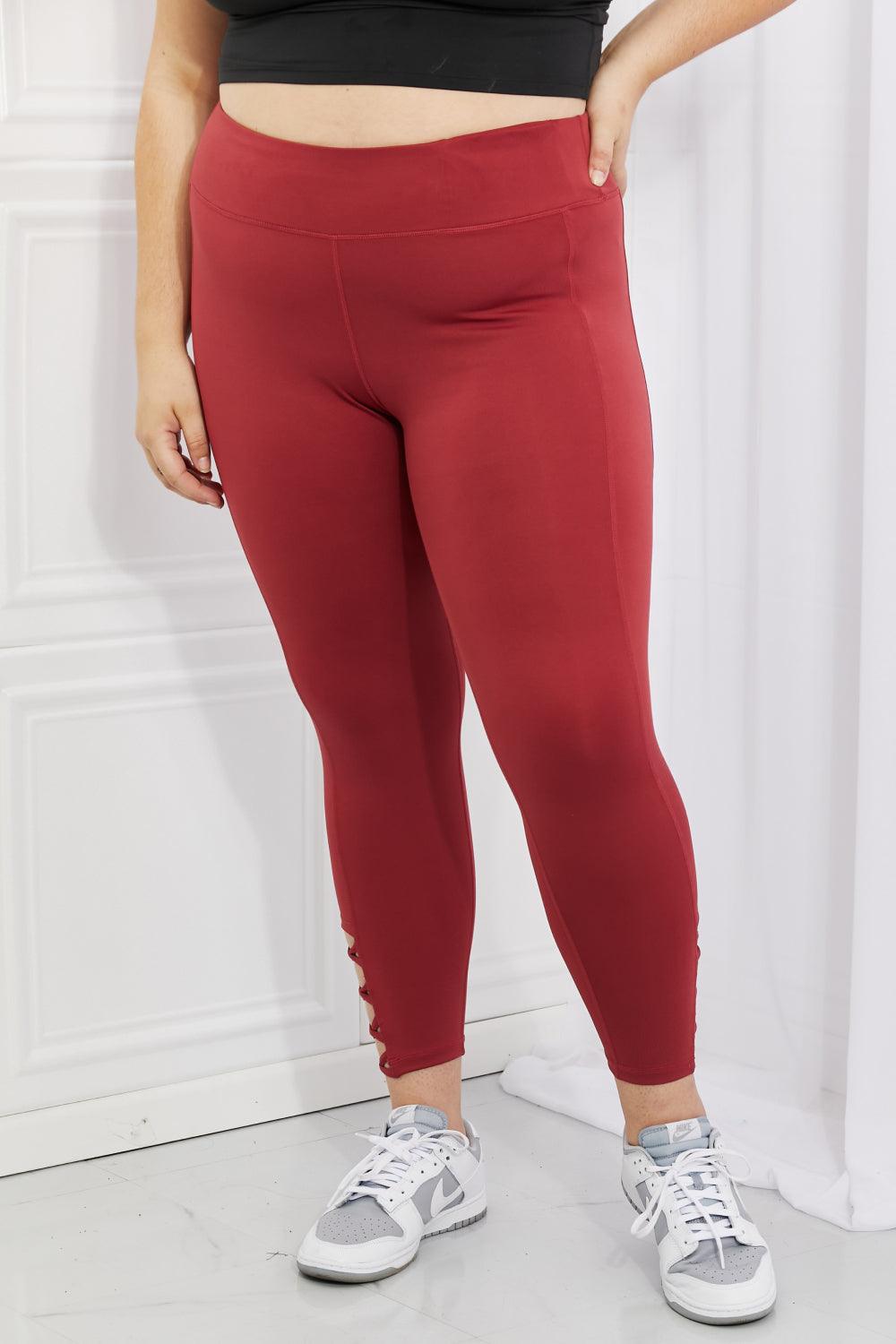 Yelete Ready For Action Full Size Ankle Cutout Active Leggings in Brick Red - Abundia House