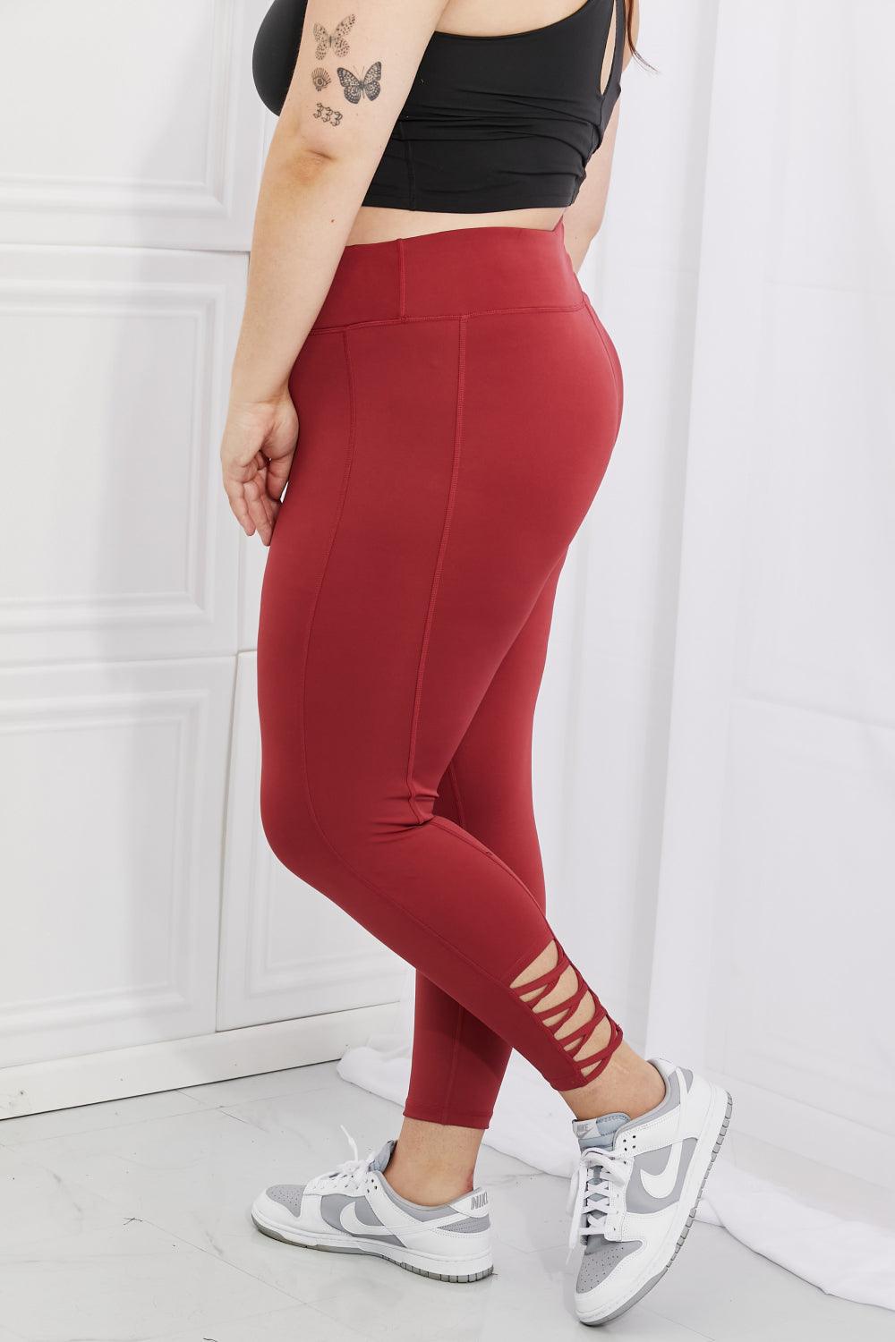 Yelete Ready For Action Full Size Ankle Cutout Active Leggings in Brick Red - Abundia House